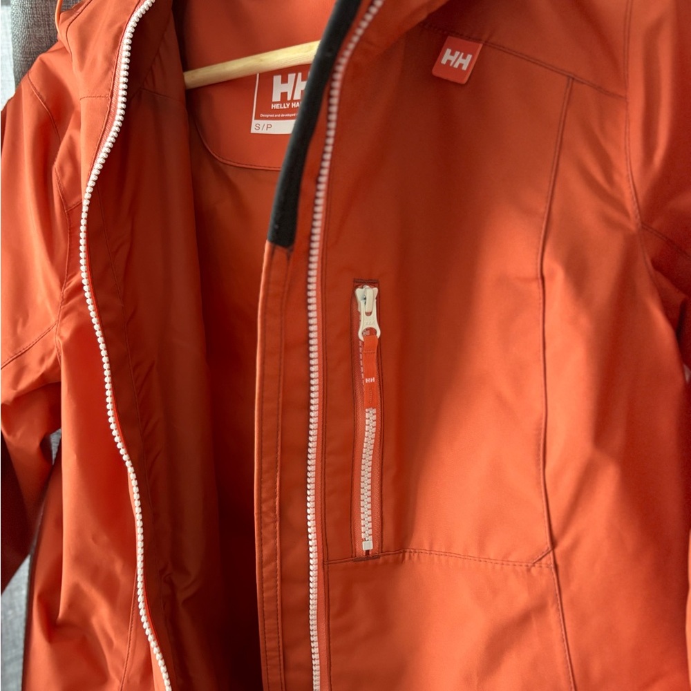 HH gorgeous melon colored jacket. I accidentally ordered 2!  White zipper